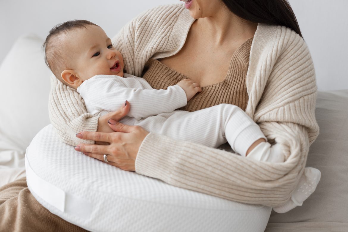 front-view-mother-holding-newborn-baby